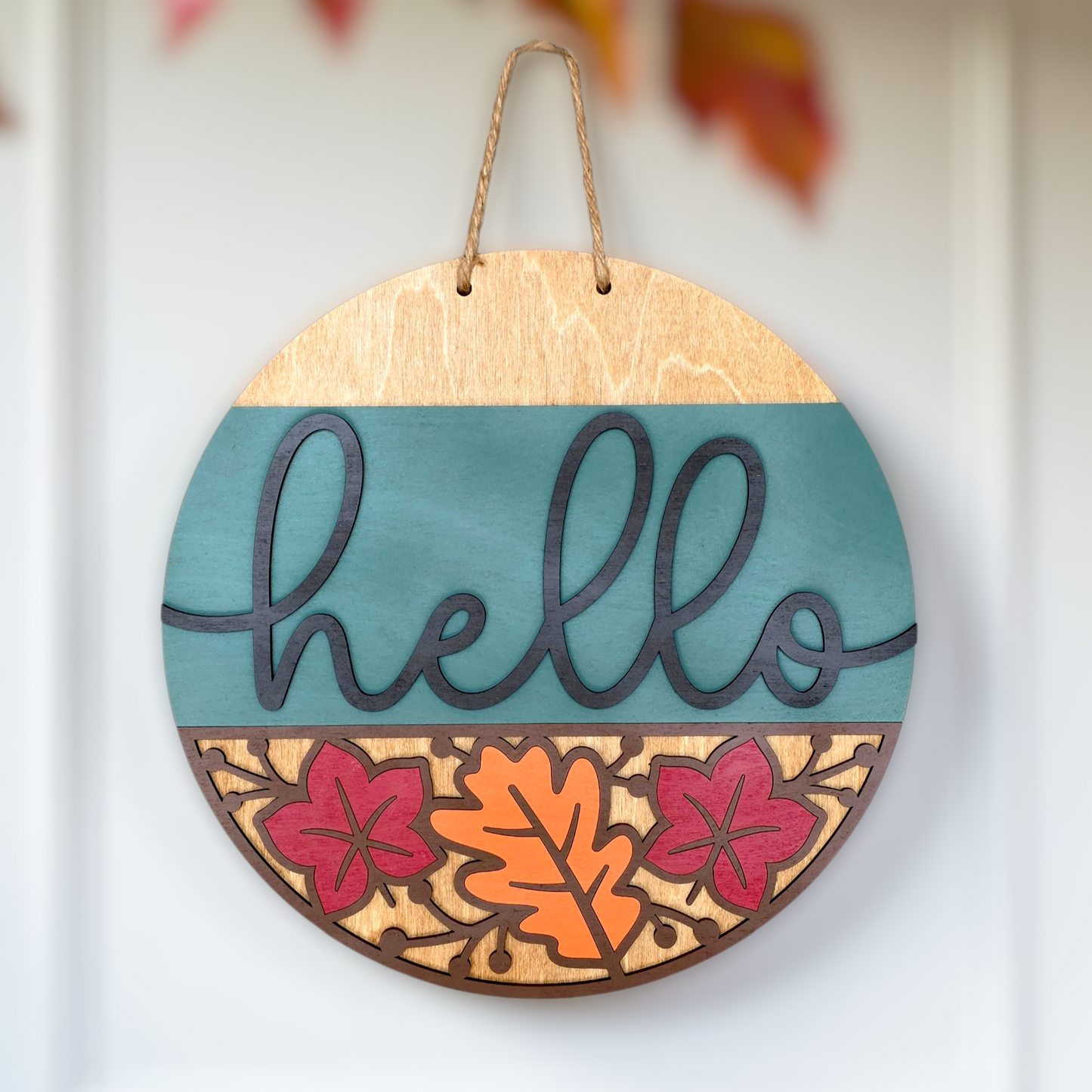 Hola con letrero de hojas