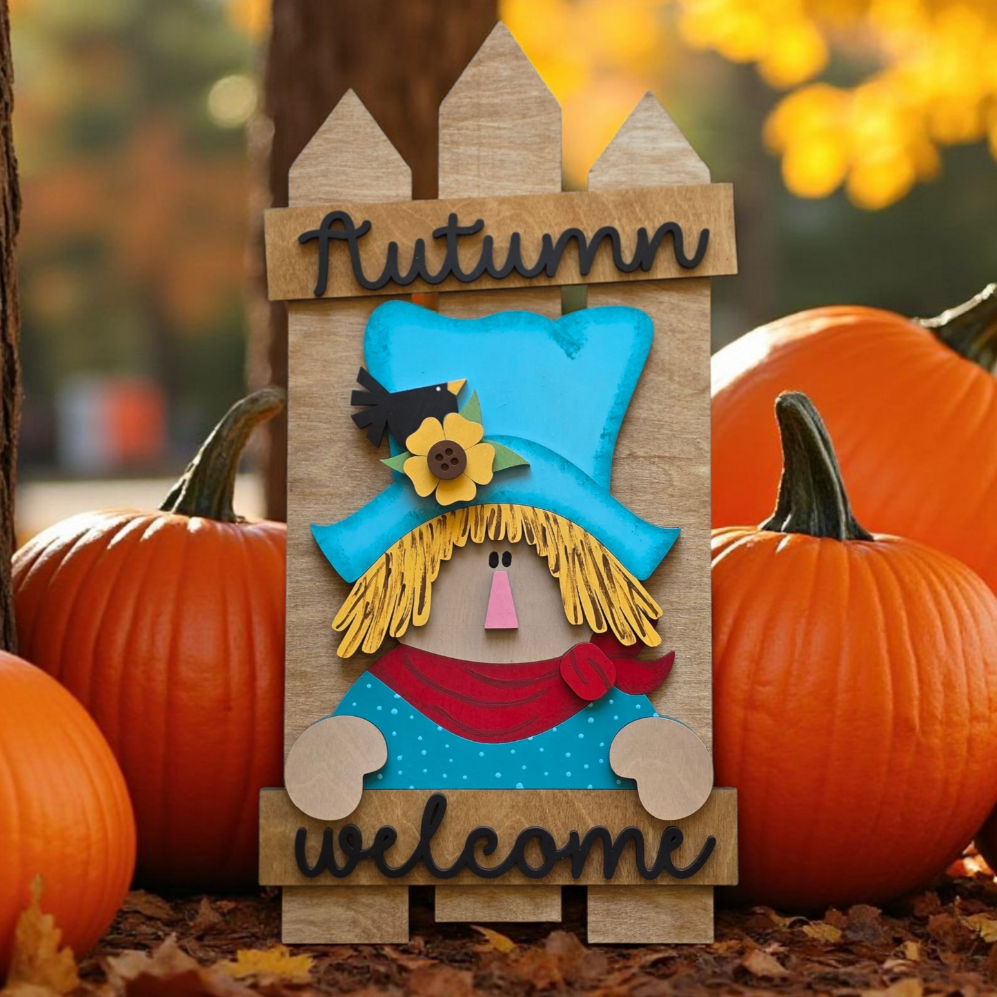 Espantapájaros de otoño para apoyar la cerca