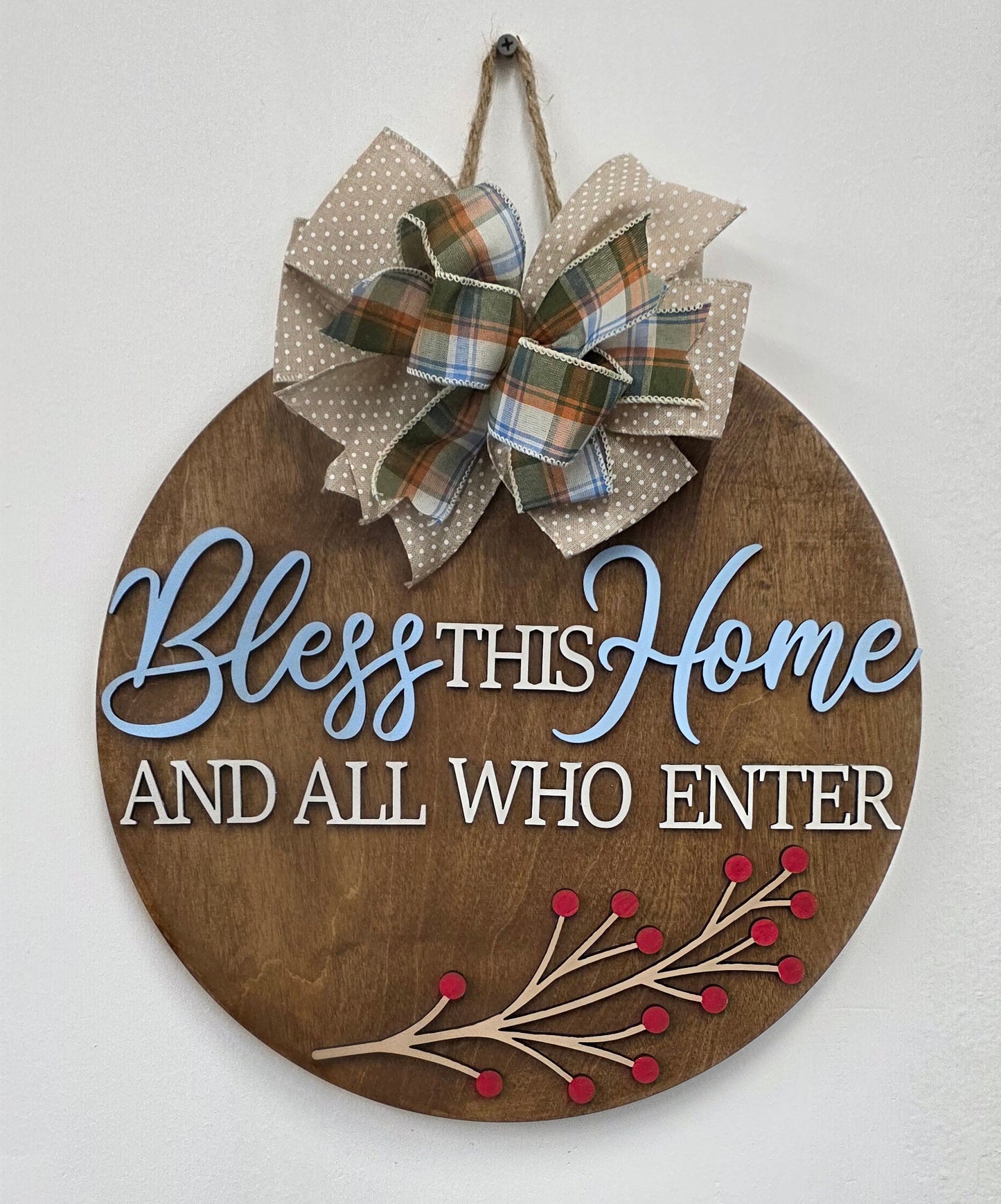 Decorative sign with text and decorative elements on a white background