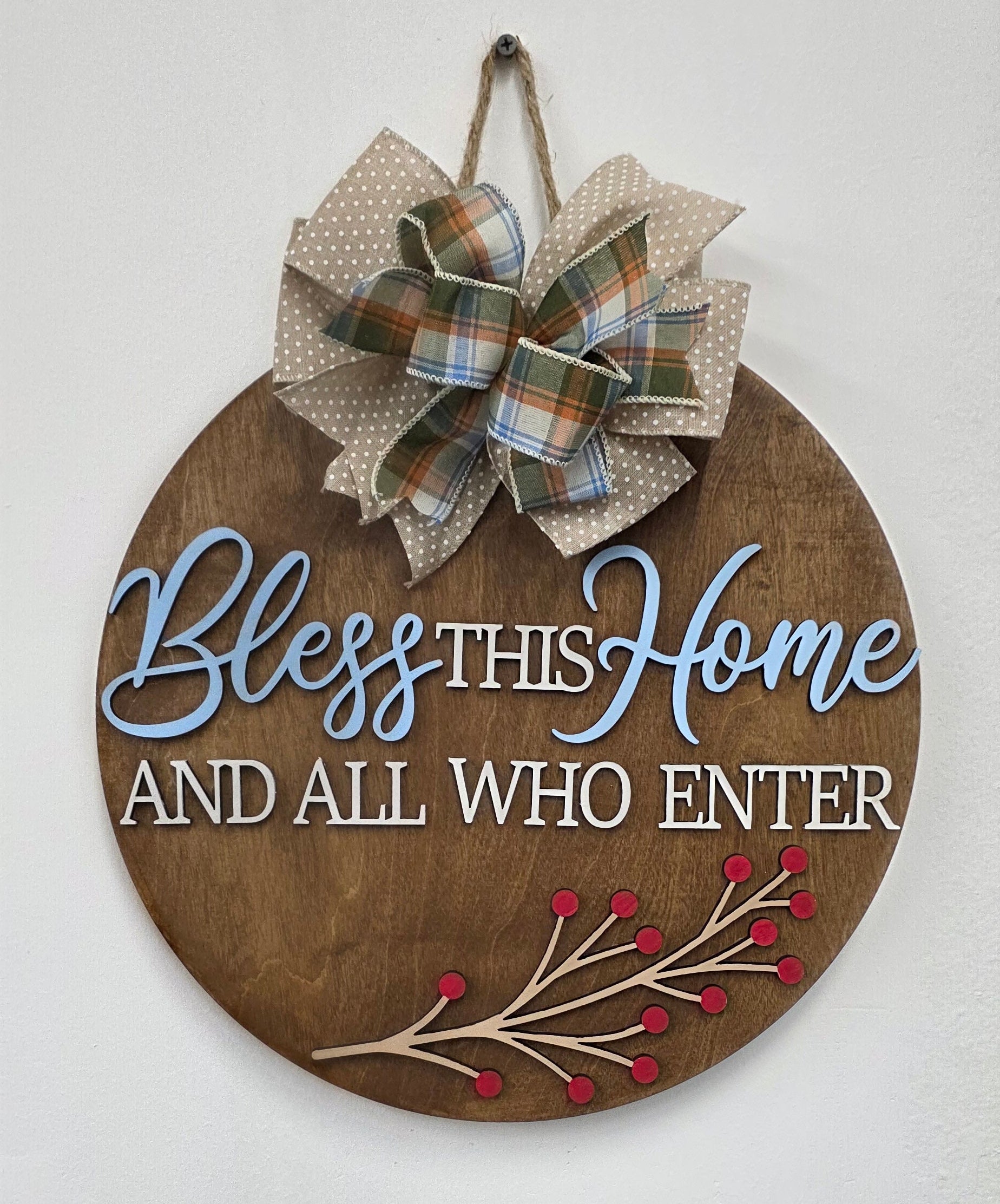 Decorative sign with text and decorative elements on a white background