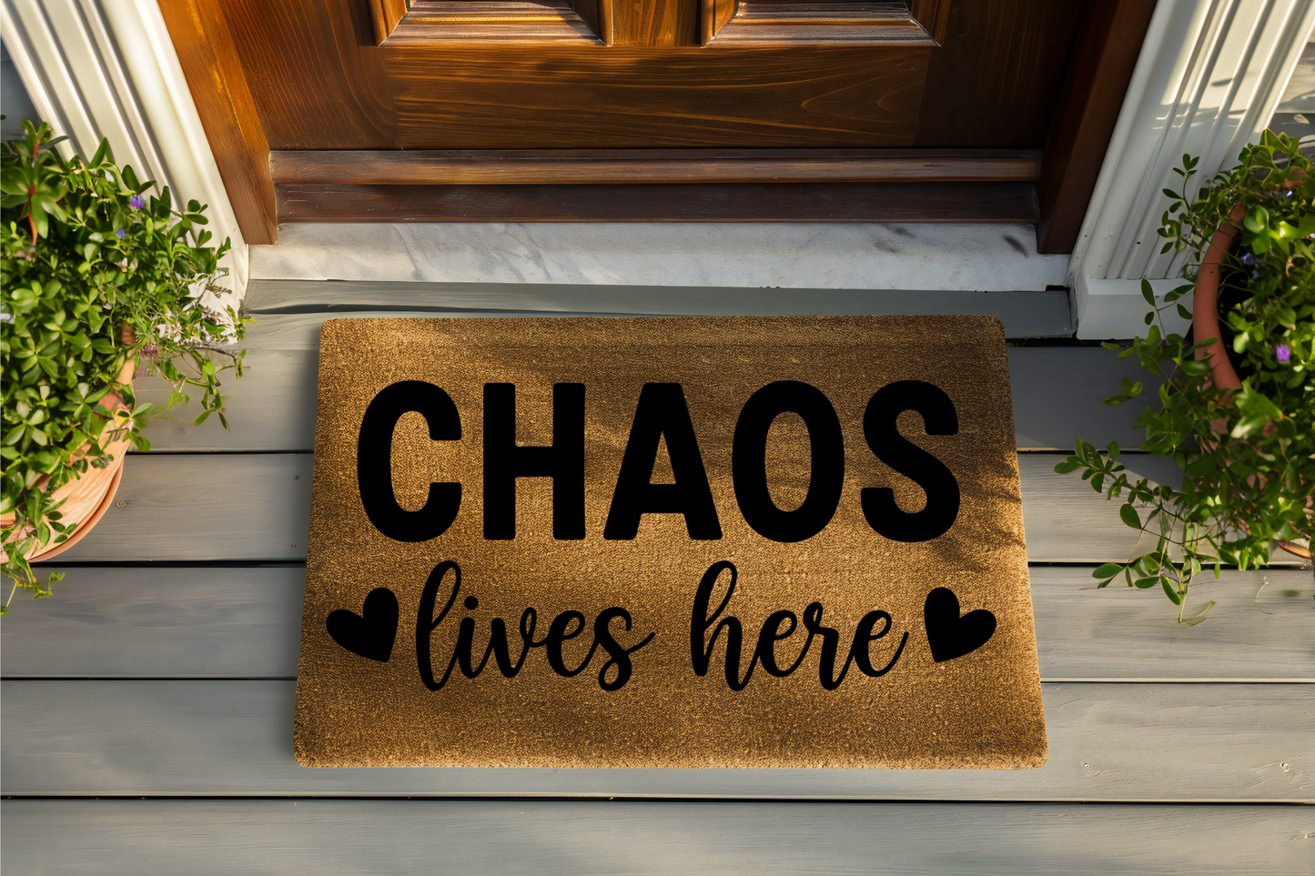 Doormat with 'CHAOS lives here' text on a wooden floor.