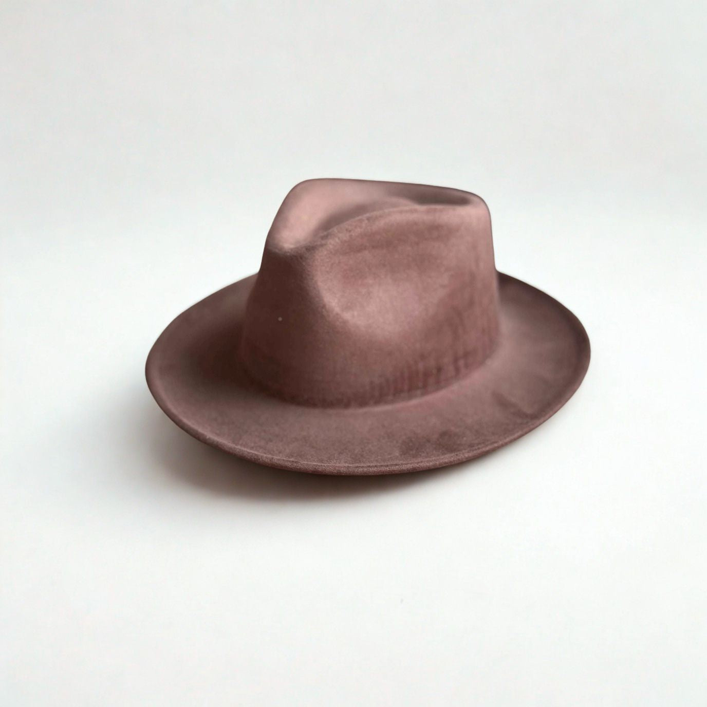 Brown fedora hat on a white background