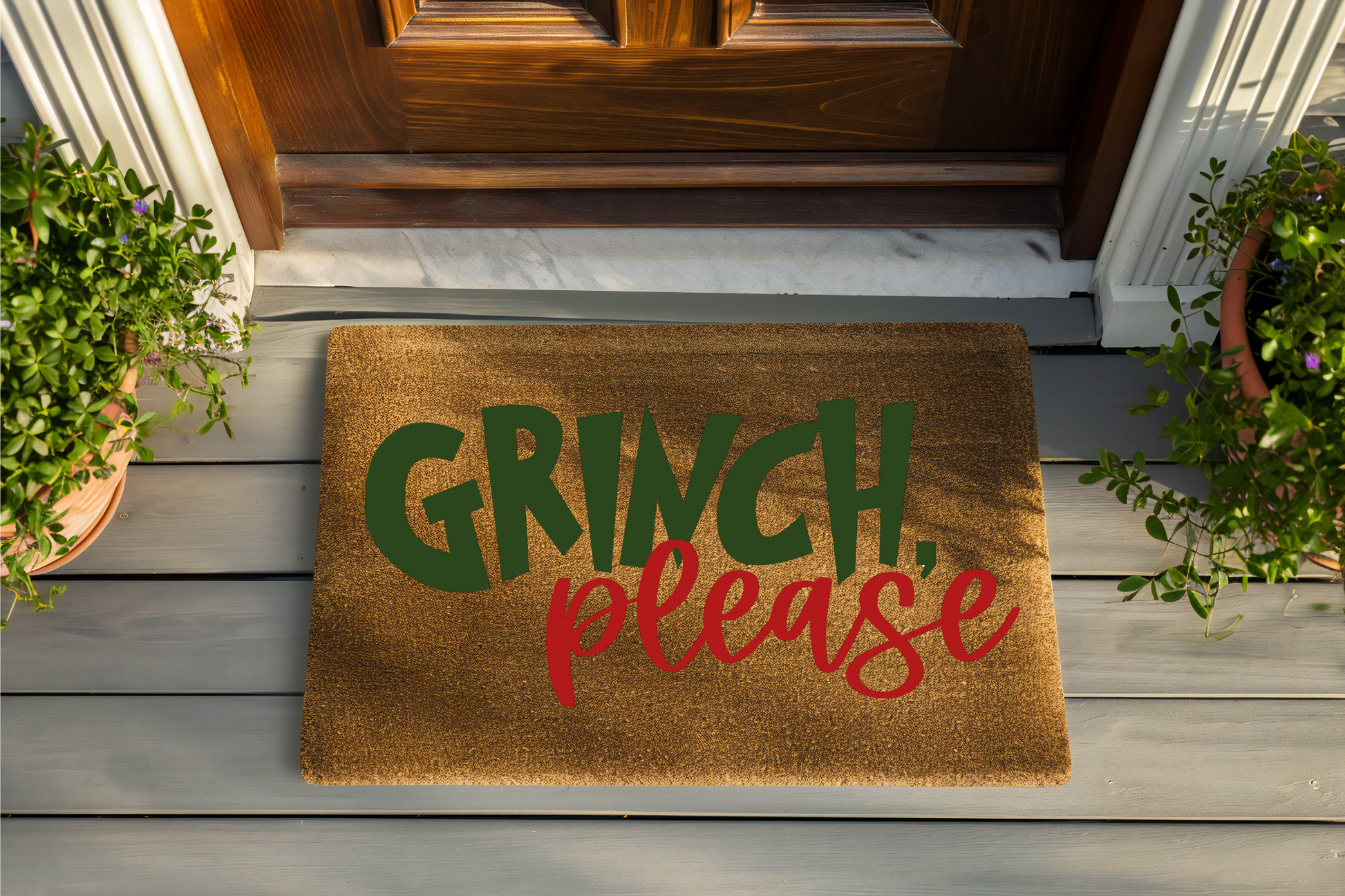 Doormat with 'Grinch, please' text on a wooden floor