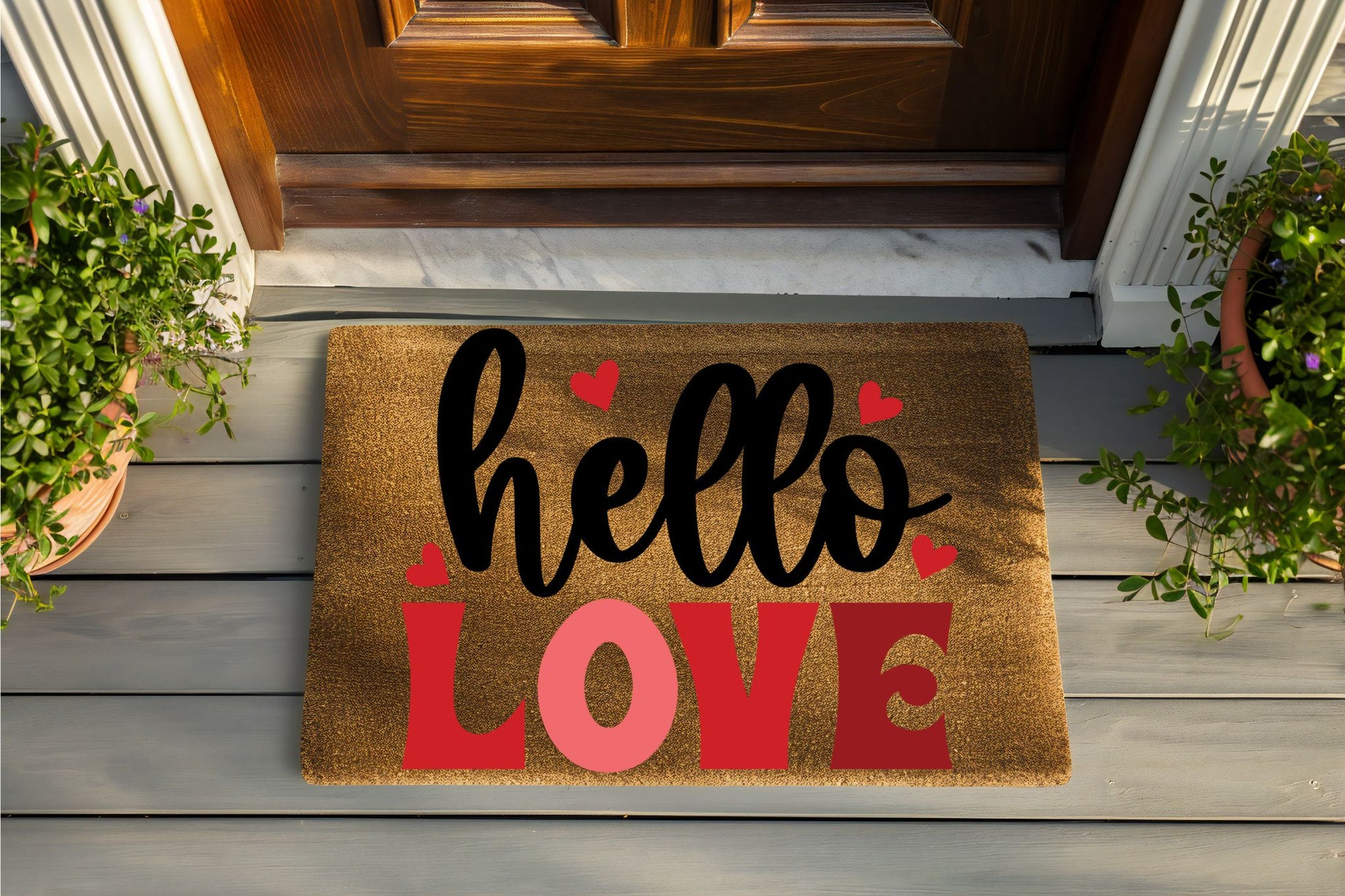 Doormat with 'hello LOVE' text on a wooden porch