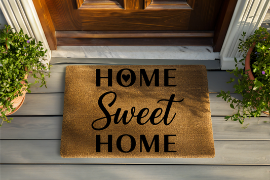 Doormat with 'Home Sweet Home' text on a wooden floor