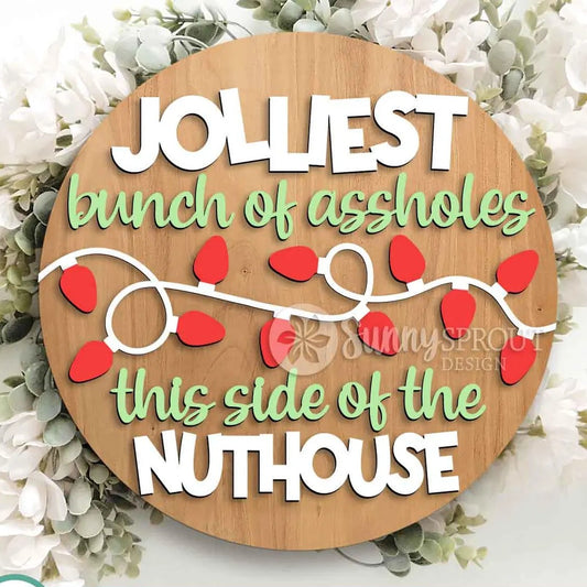 Wooden round sign with humorous text and red lights on a floral background