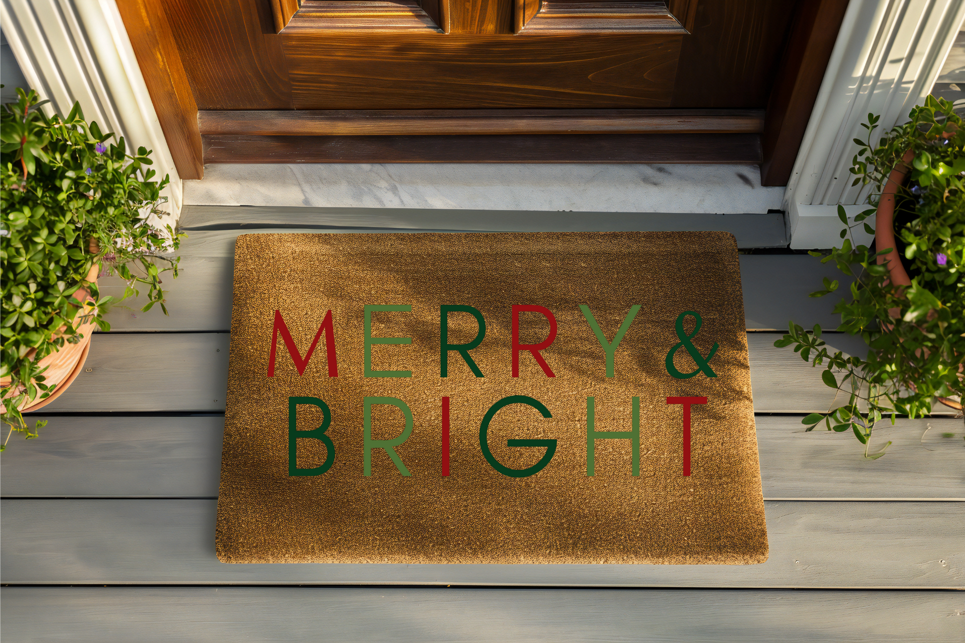 Doormat with 'Merry & Bright' text on a wooden porch