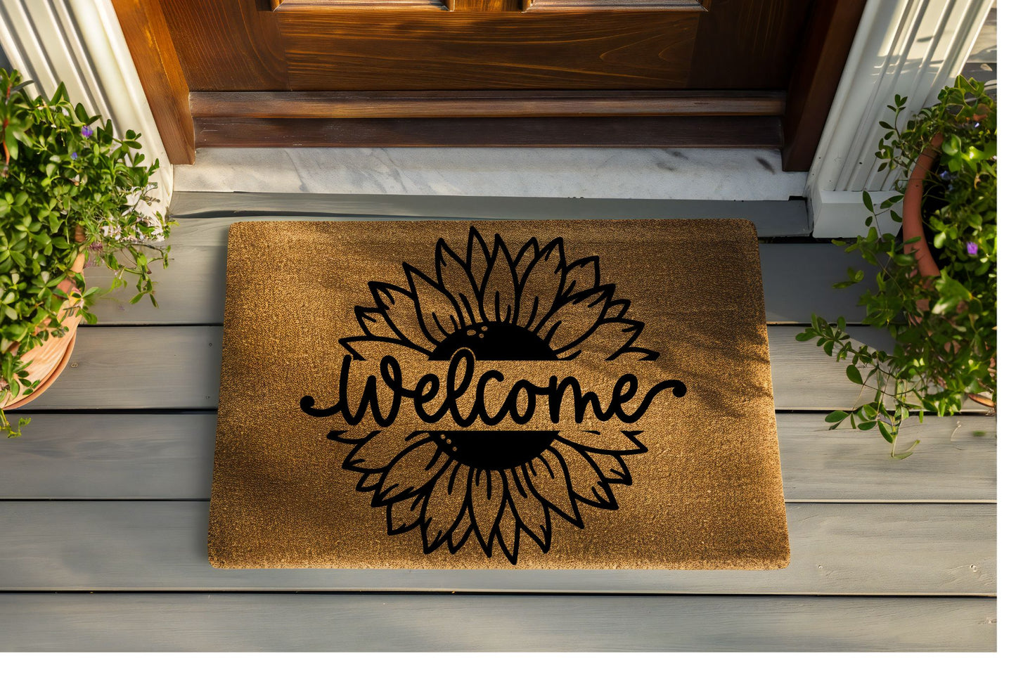 Doormat with sunflower design and 'welcome' text on a wooden deck.