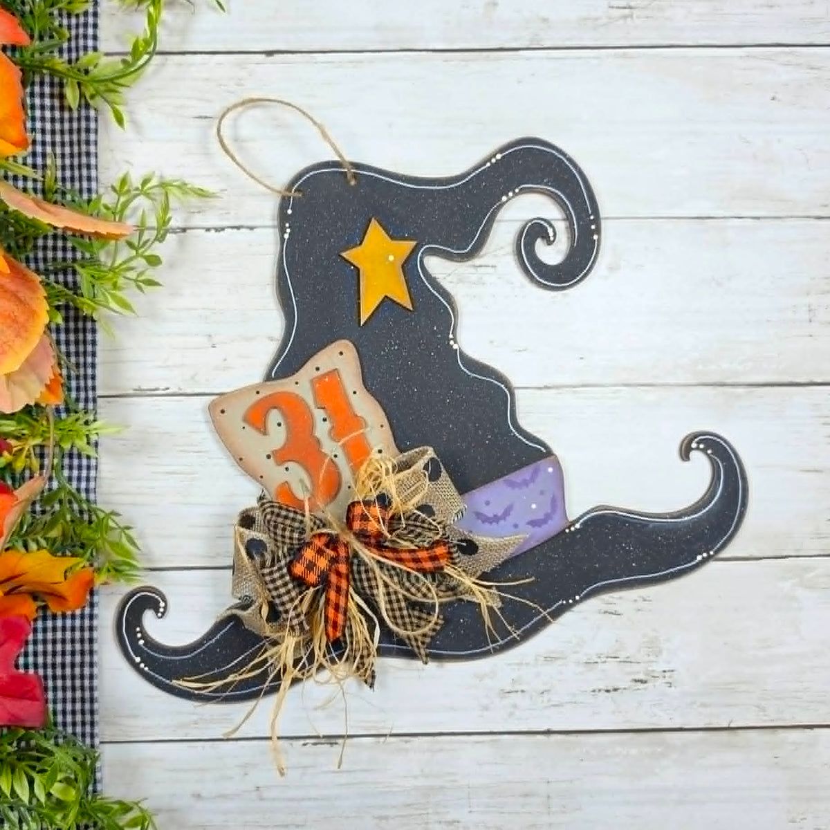 Witch Hat Sign adorned with a bow